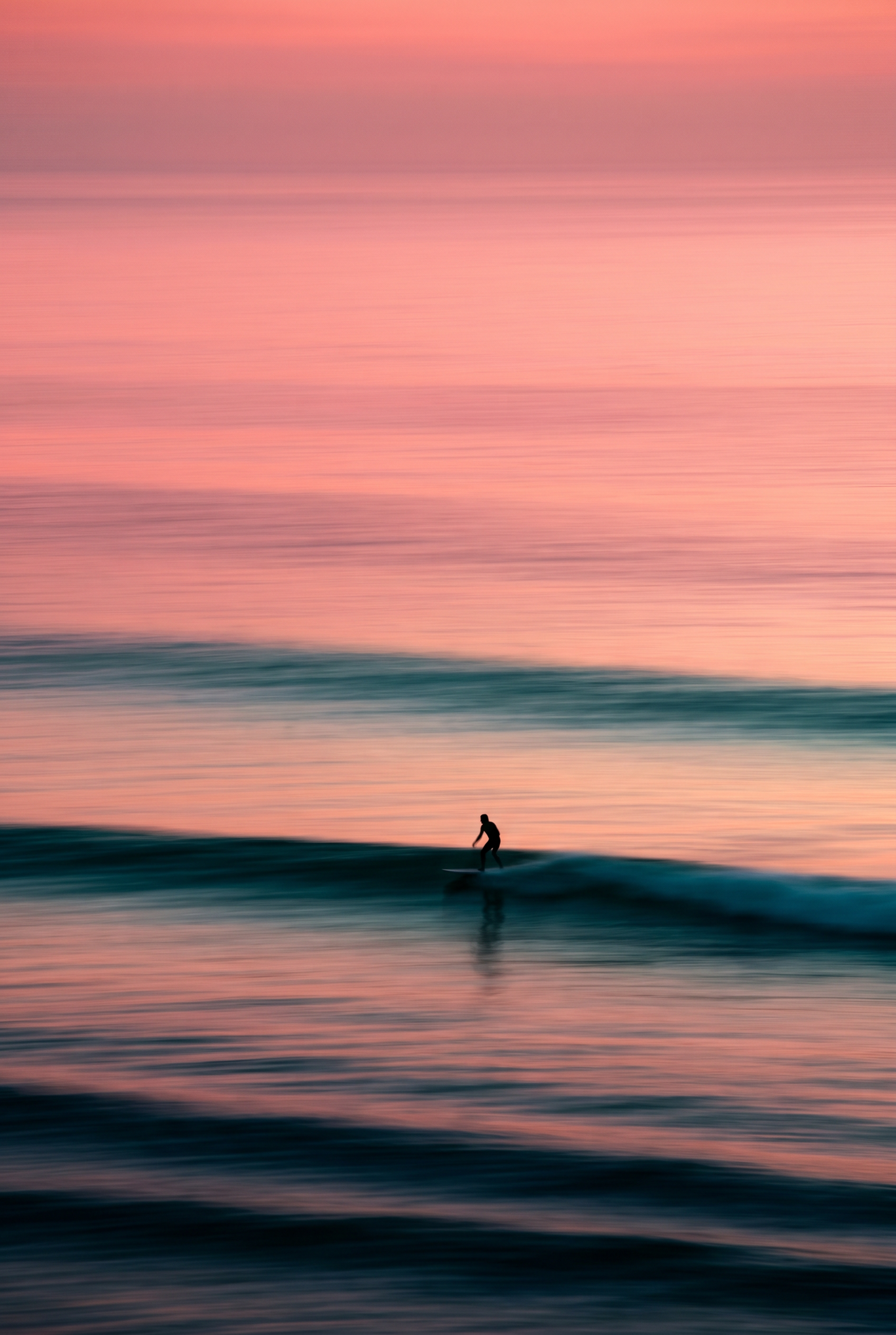 Surfer At Sunset